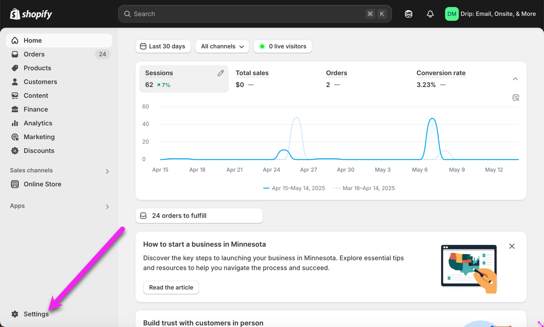 Shopify Admin main page with arrow pointing Settings on bottom left corner